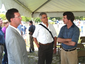 Skidaway scientist Jim Nelson (r) talks with guests. 